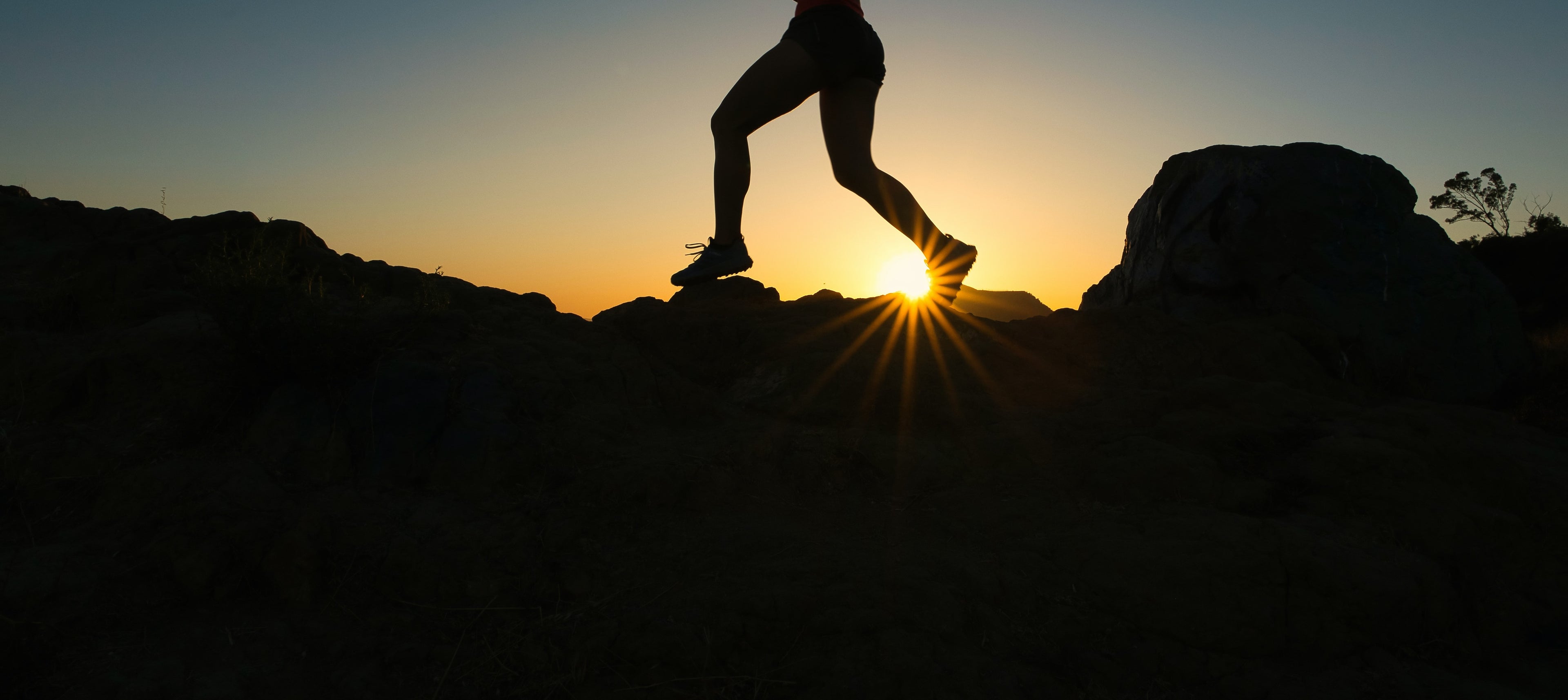 a determined runner is depicted, pushing forward with resolve, against the backdrop of a challenging course. With each stride, they symbolize the triumph over obstacles, embodying resilience and determination. Their posture exudes strength and focus, illustrating the relentless pursuit of their goals. It's a powerful depiction of perseverance and achievement in the face of adversity.